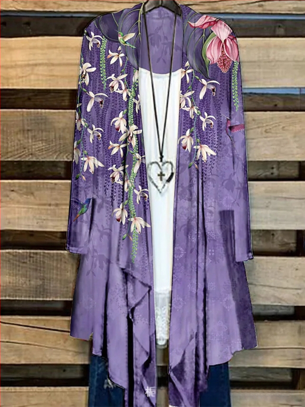 Moteriški marškiniai su ilgomis rankovėmis su spauda, ilgesnė kirpimo linija ir kailio apykakle, poliesteris