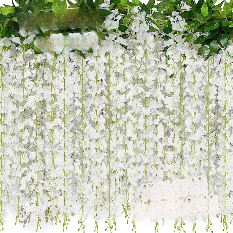 Umelā vistērijas virtene iekšējai dekorācijai; materiāls: plastmasa un zīda ziedi; tehnika: bone shot; šķirne: vistērija; pielietojums: fotorekvizīti, mājas dekorēšana