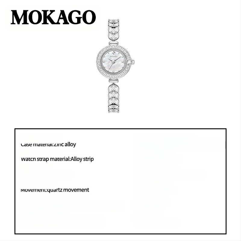 Naise kvartsikell teemantidega kaunistusega ja vasest kettaga kalasaba kujul, ümmargune kellakera (kvartsliikumine; teemantidega kaunistus; vasest kett kalasaba kujul; veekindlus 30 m; ümmargune kellakera)