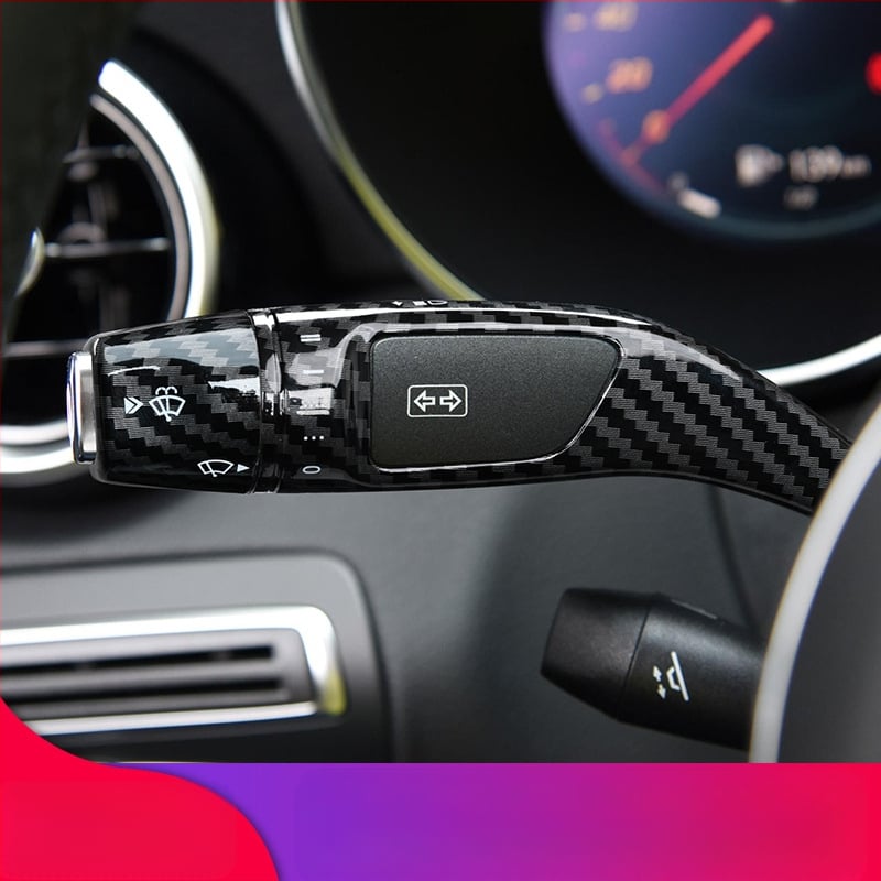 Universali magnetinė diegimo sistema vairuotojo rato pavarų svirtelei ir valytuvo svirčiai