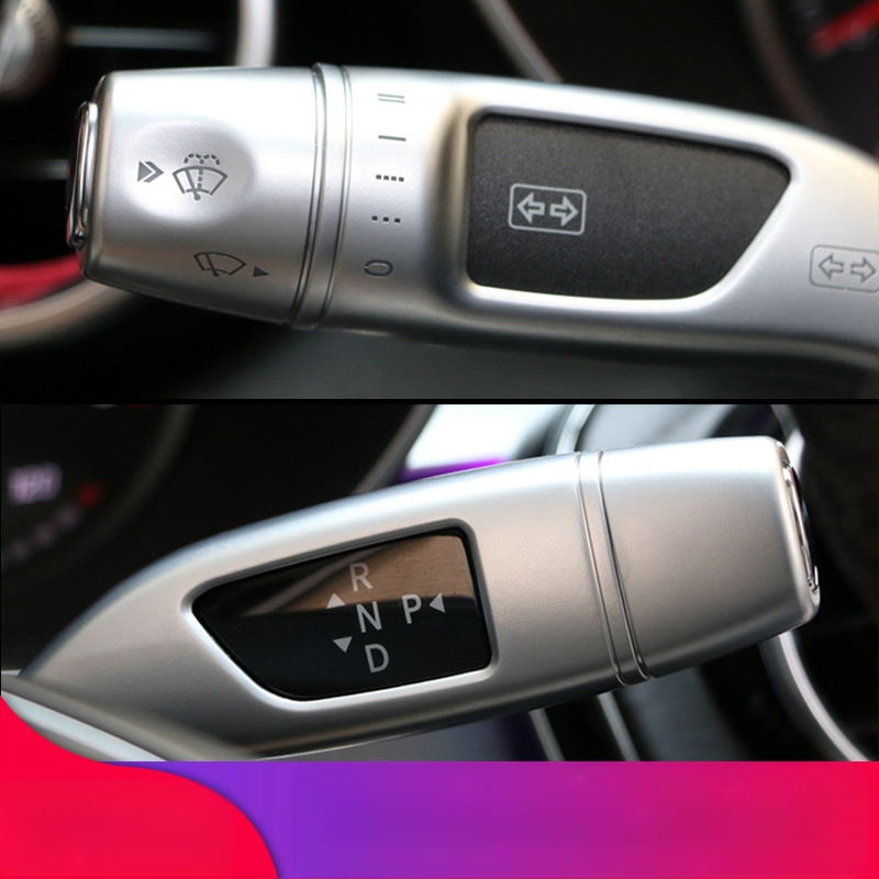 Universali magnetinė diegimo sistema vairuotojo rato pavarų svirtelei ir valytuvo svirčiai