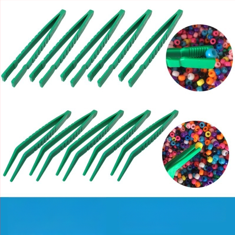 Montessori ugdymo žaislas: metalinės žnyplės smulkiajai motorikai, moksliniams stebėjimams (Kilmė: Pekinas; Amžius: 0-2 metai)