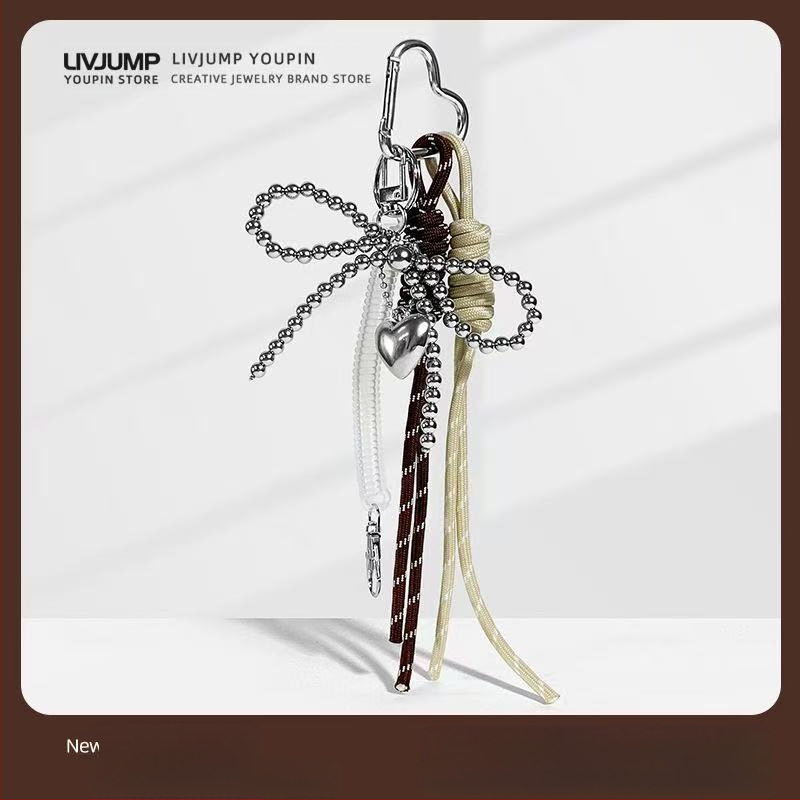 Somas pakaramājs: neilona austā siksna ar mašulīte, ģeometrisks raksts, izsmalcināts pieaugušās sievietes stils, pavasaris 2025