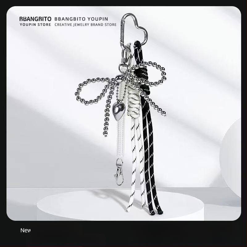 Somas pakaramājs: neilona austā siksna ar mašulīte, ģeometrisks raksts, izsmalcināts pieaugušās sievietes stils, pavasaris 2025