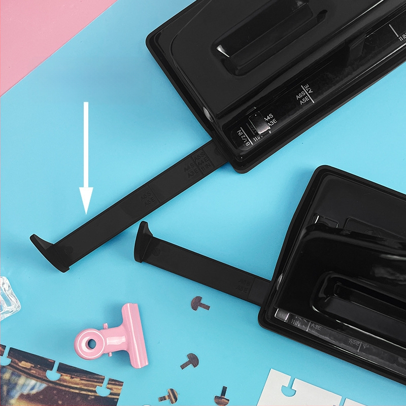 Négylyukas lyukasztó — kézi működtetés, 1–5 lapig, tömege 0,45 kg