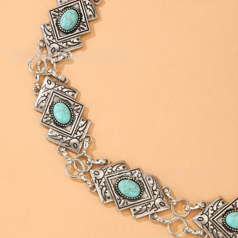 Metalinė juosmens grandinė retro stiliuje su įliejtais elementais ir lobster tipo užsegimu, 2023 m. pavasaris