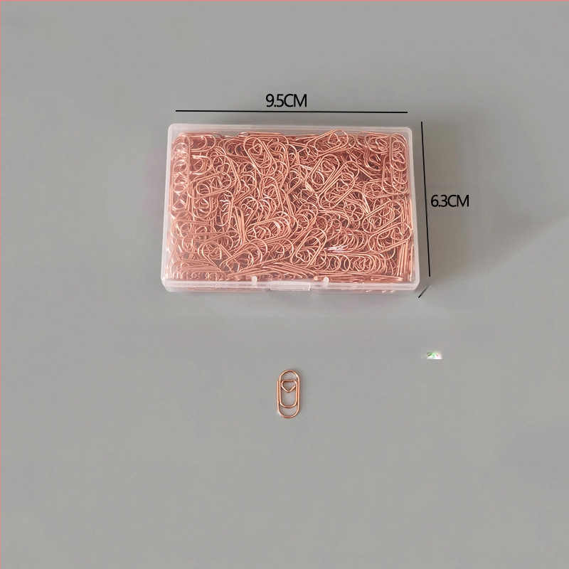 Mini szív alakú papírkapcsok, fém-plasztik felépítés, átlátszó műanyag dobozban – irodai kellékek