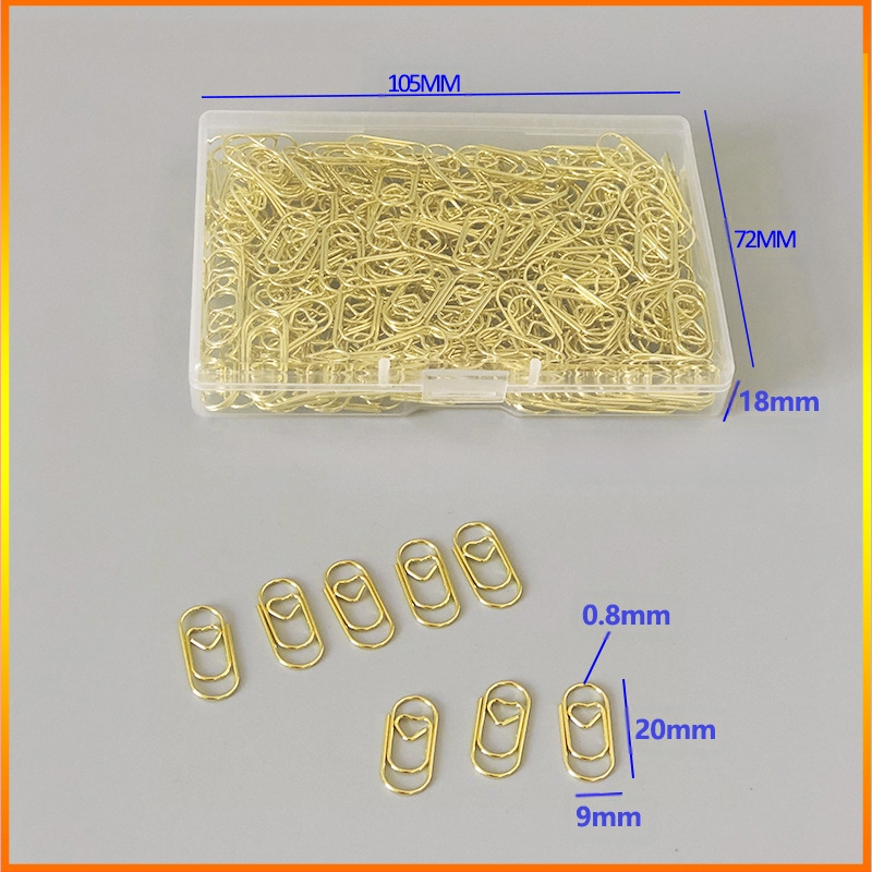 Mini szív alakú papírkapcsok, fém-plasztik felépítés, átlátszó műanyag dobozban – irodai kellékek