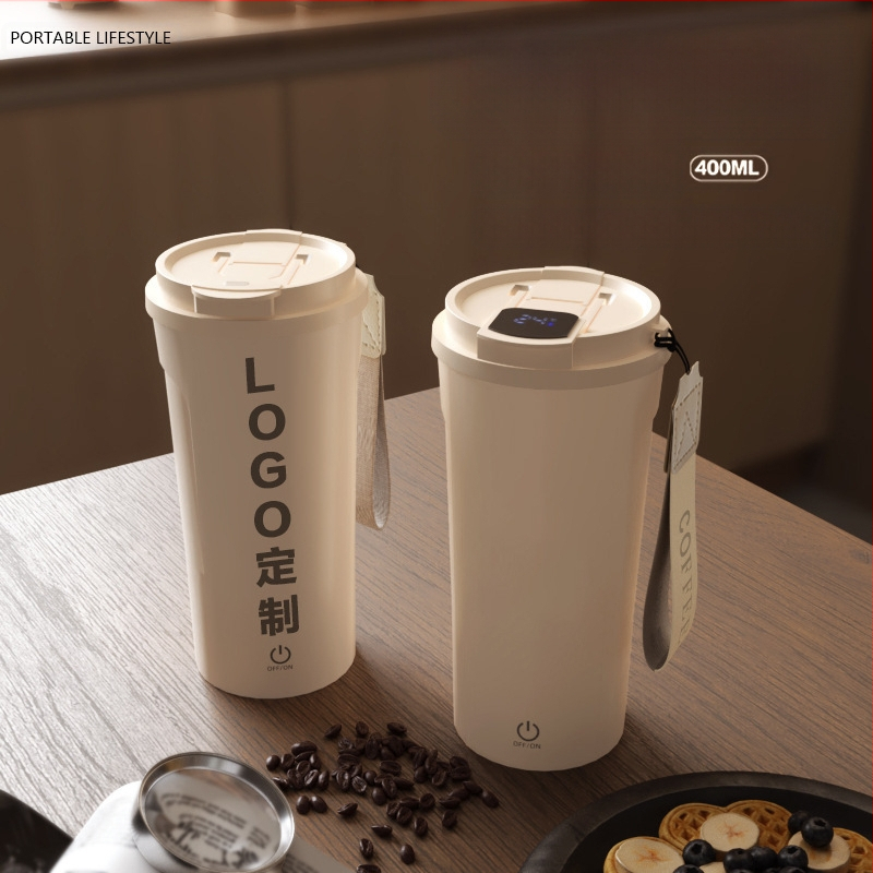 Kafes krūze ar karikatūras motīvu un digitālo displeju, pilnīgi automātiska magnetiskā maisīšana, svars 350 g, iespējams pielāgot logotipu, izlaista 2025.