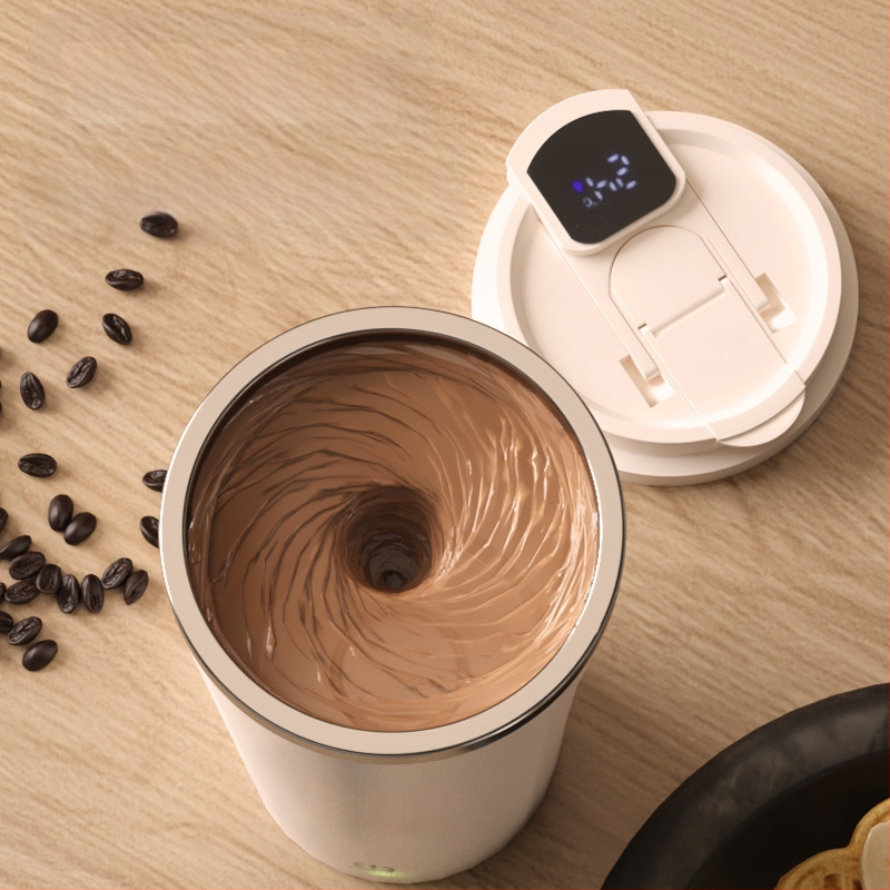 Kafes krūze ar karikatūras motīvu un digitālo displeju, pilnīgi automātiska magnetiskā maisīšana, svars 350 g, iespējams pielāgot logotipu, izlaista 2025.