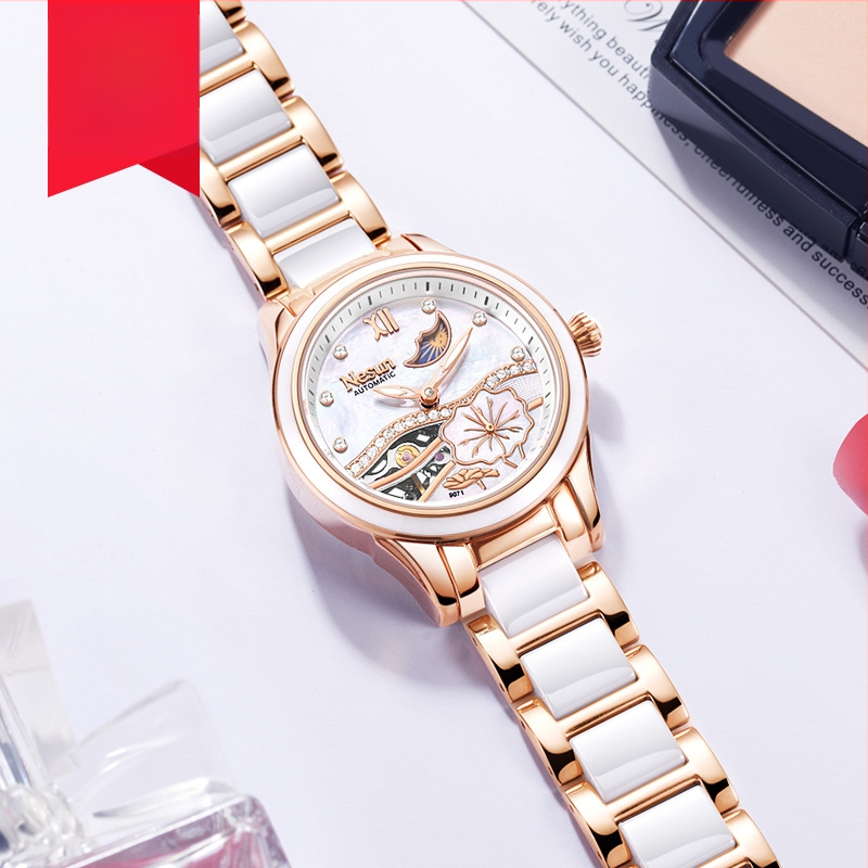 NESUN naistele – täielikult automaatne mehhaaniline käekell, keraamiline korpus ja rihm, 50 m veekindlus, Kuu faas ja luminoorne displei, analoogne näit