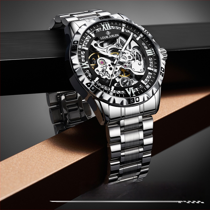 Meeste skelet-mehaaniline käekell, 30 m veekindlus, keeratav kroon, läbipaistev tagakaas, roostevabast terasest rihm liblika klipsuga