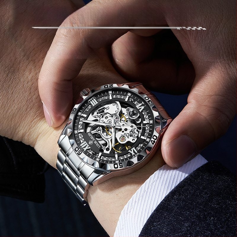 Meeste skelet-mehaaniline käekell, 30 m veekindlus, keeratav kroon, läbipaistev tagakaas, roostevabast terasest rihm liblika klipsuga