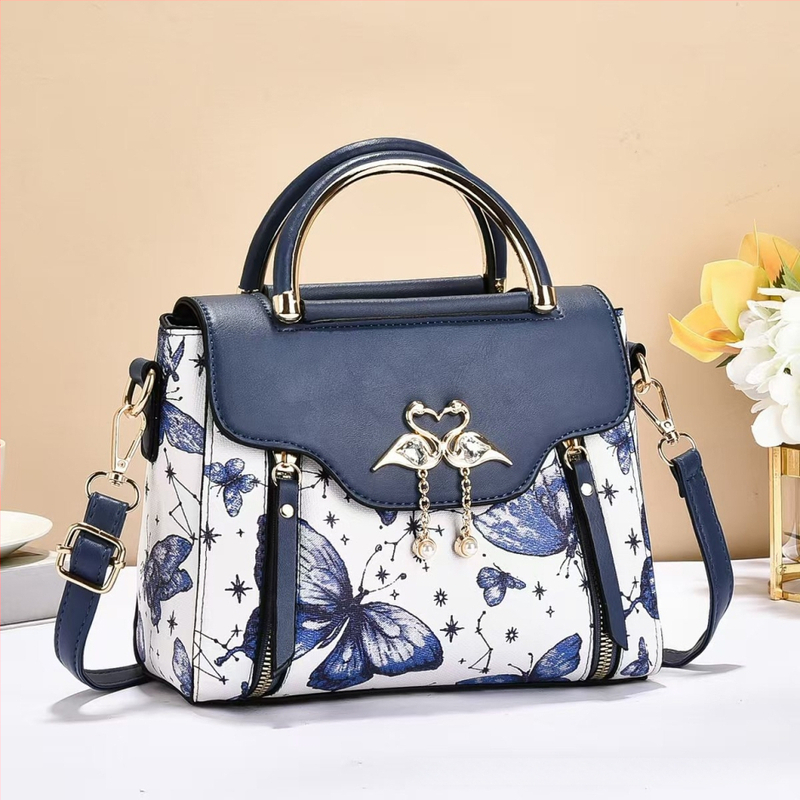 PU materjaliga kott | Linna minimalistlik stiil | Väike ruudukujuline kuju | Kaane sulgemine flapp-tyylis | Sisetaskud: varjatud tõmblukuga tasku, telefoni tasku, osakondade tasku