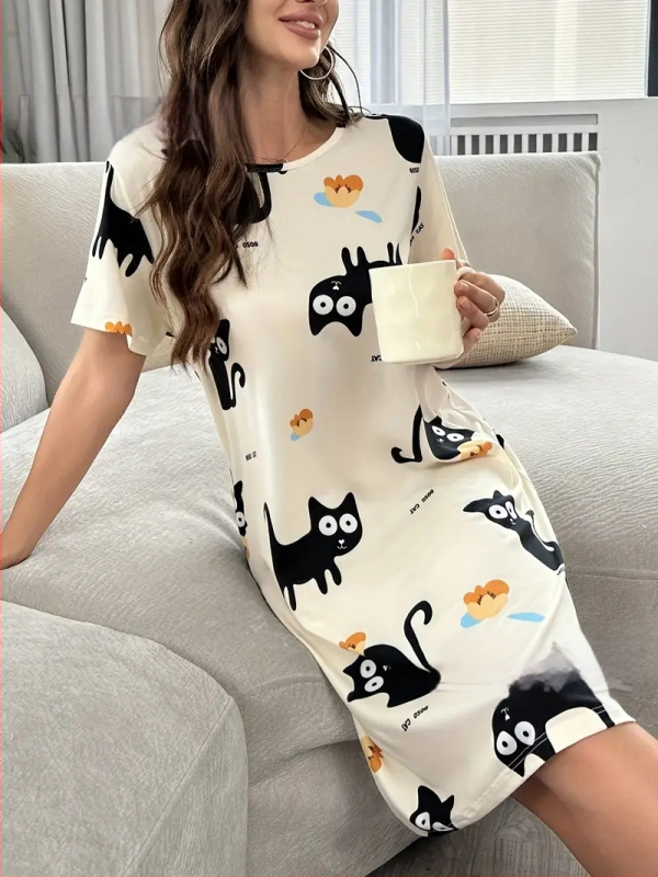 Jednodielne luxusné pyžamové šaty s kruhovým výstrihom, midi dĺžka, 100% polyester.