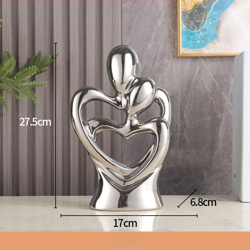 Porcelánová socha: abstraktný pár objímajúci sa - moderný minimalistický, geometrický dizajn