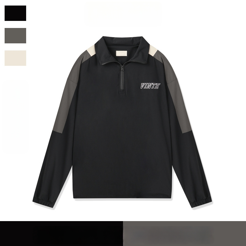 Vetrovka s dizajnom color-block a polovičným zipsom, stojací golier, voľný strih