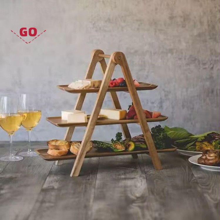 Trojúrovňový drevený stojan na servírovanie, skladací, z tungového a akáciového dreva