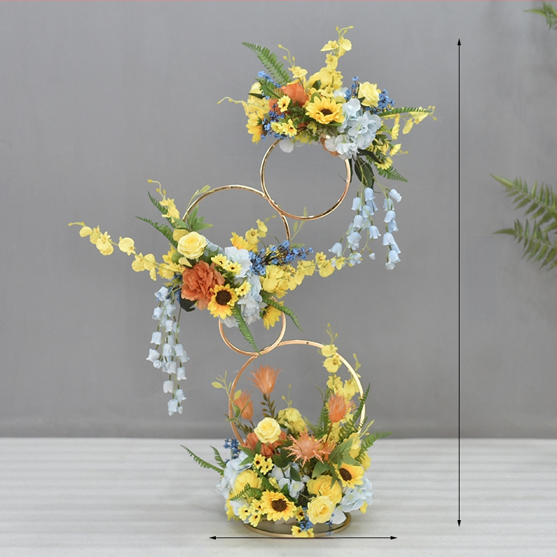 Donut tvarovaný ozdobný kovový kvetinový doplnok so hodvábnymi margarétami