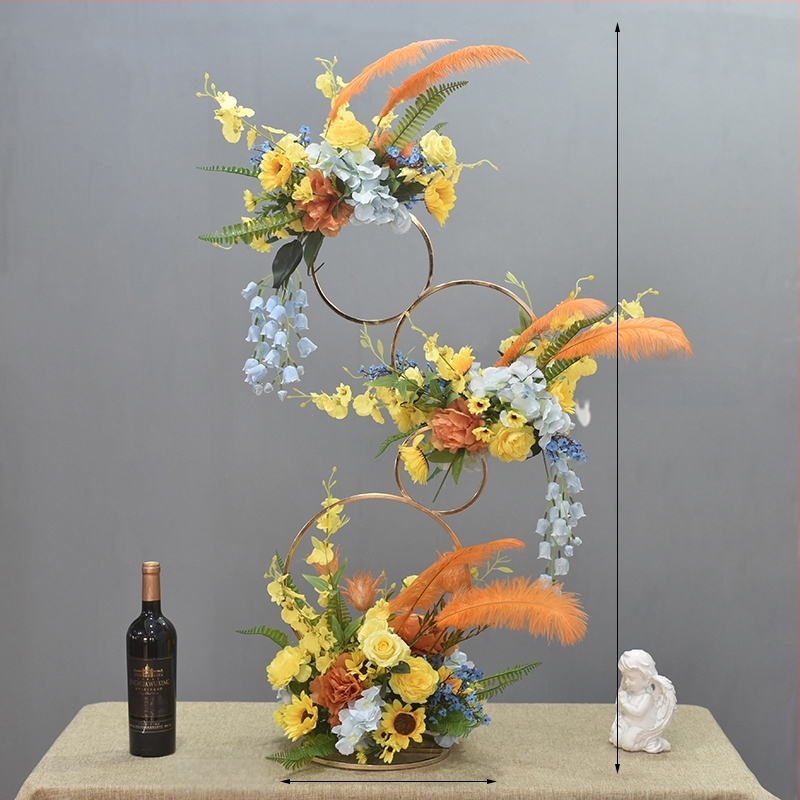 Donut tvarovaný ozdobný kovový kvetinový doplnok so hodvábnymi margarétami