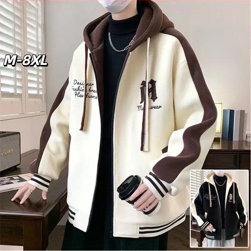 Meeste kapuutsiga jakk, tikandiga, paks polüesterseguga, vaba lõige, tõmblukk.