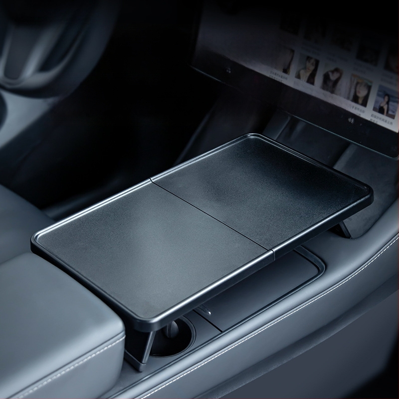 Plastmasas automobiļa ēdienu paliktnis Tesla Model Y3 ar salokāmu dizainu, snap-in uzstādīšanu un svaru 0,25 kg.