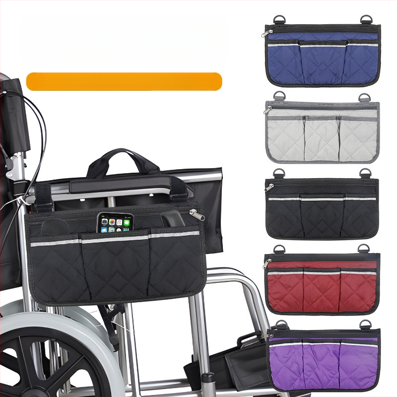Ratastooli küljele kinnitatav hoiukott — mitmeotstarbeline tasku helkurribadega, ruudukujuline kuju, sobib reisidele ja kärudele
