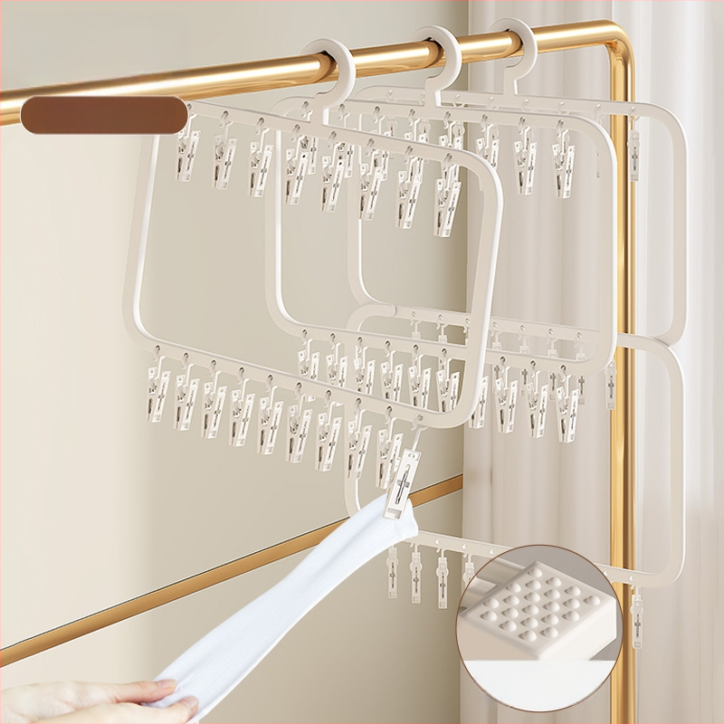 Sušiak na ponožky s viacerými klipsami – plastový vešiak, odolný voči vetru, na domáce aj balkónové použitie.