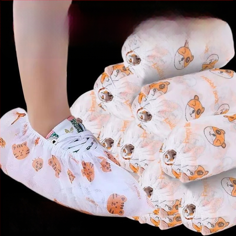 Jednorázové návleky na topánky s karikatúrnym vzorom, z netkaného materiálu, 50 kusov, biologicky rozložiteľné, možnosť personalizácie potlače