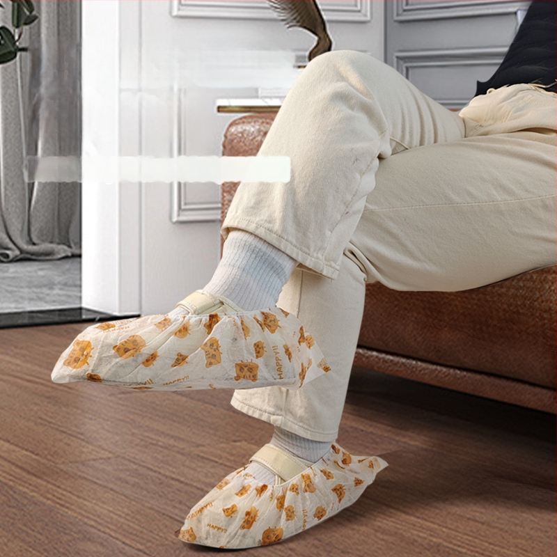 Jednorázové návleky na topánky — netkaná textília, hrúbka 0,02, odolné voči prachu, životnosť 2 roky, balenie 200 kusov