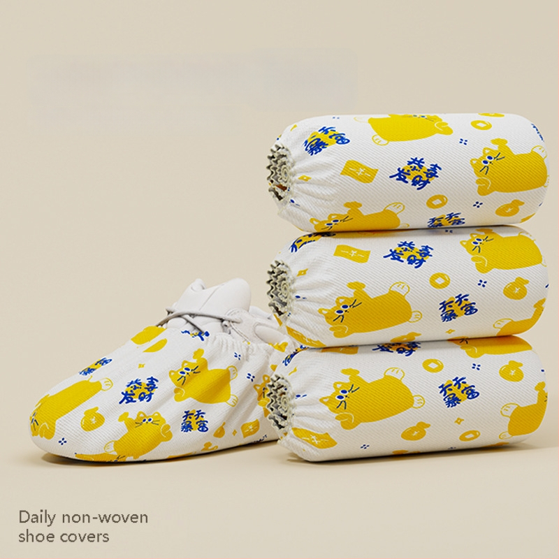 Jednorazové návleky na topánky do interiéru, hrubšie netkané textílie, ochrana proti prachu, protišmykové, vzor šťastná mačka