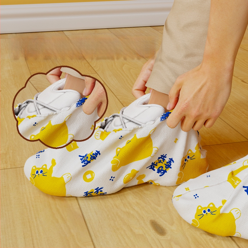 Jednorazové návleky na topánky do interiéru, hrubšie netkané textílie, ochrana proti prachu, protišmykové, vzor šťastná mačka