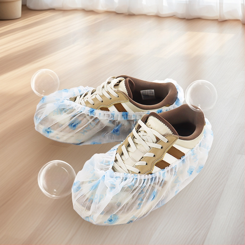 Jednorazové vnútorné návleky na topánky, netkané, protisklzové, vzor Bear Head HAPPY, hrúbka 2 g, pre dospelých