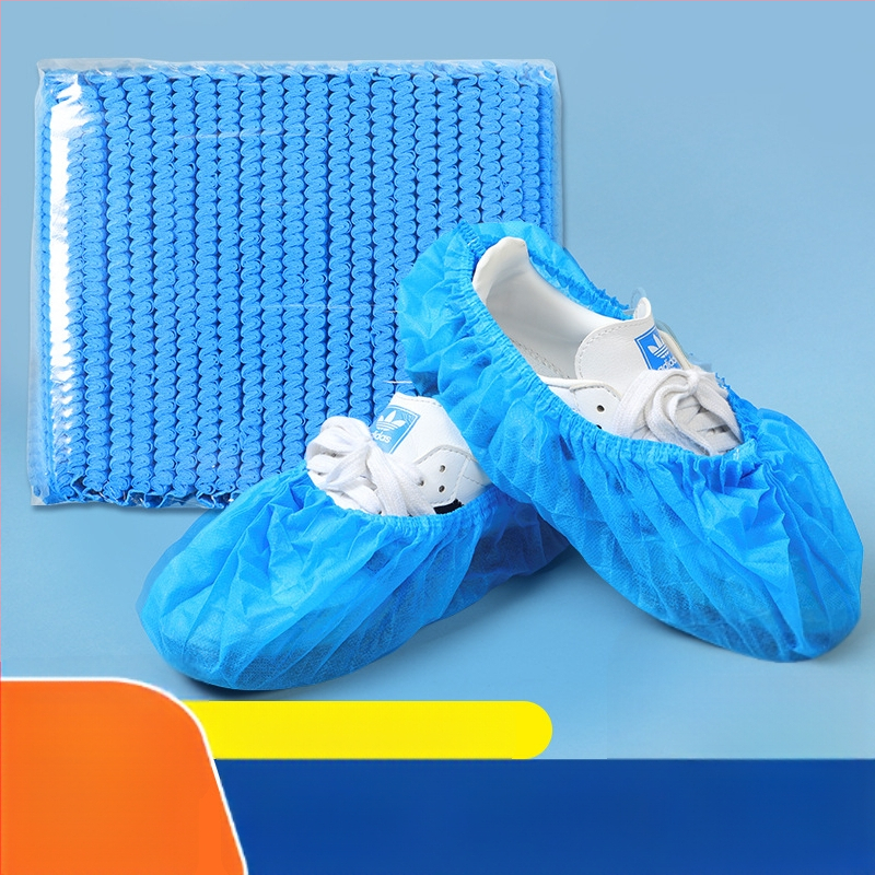 Hrubé jednorazové návleky na topánky z netkanej textílie, priedušné, protišmykové, prachotesné pre domáce použitie; hrúbka 300 g; 100 ks v balení