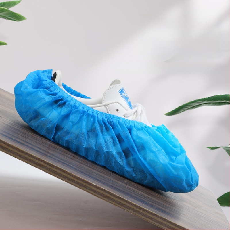 Hrubé jednorazové návleky na topánky z netkanej textílie, priedušné, protišmykové, prachotesné pre domáce použitie; hrúbka 300 g; 100 ks v balení