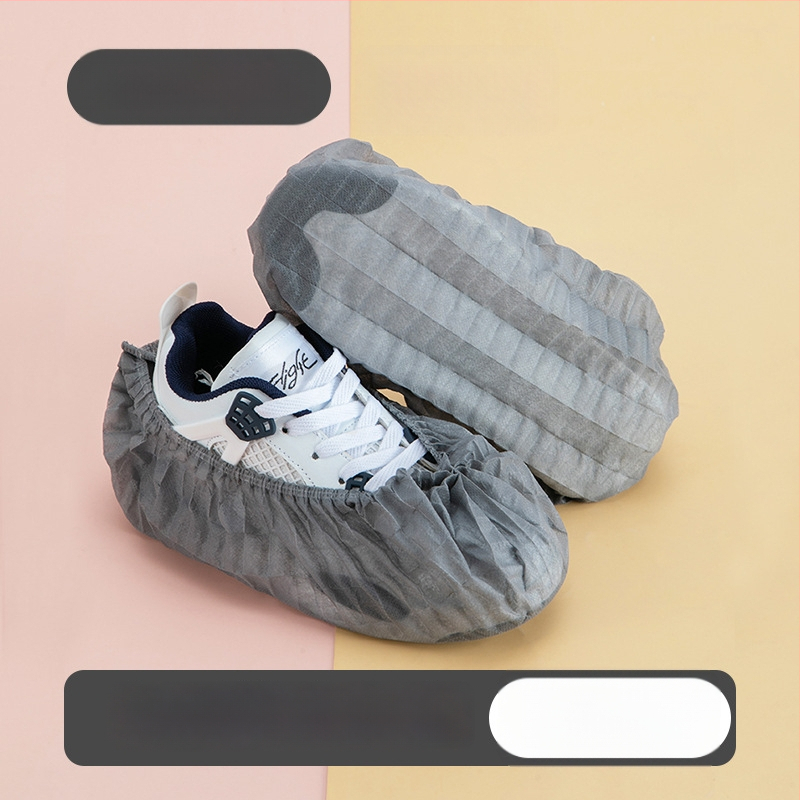 Hrubé jednorazové návleky na topánky z netkanej textílie, priedušné, protišmykové, prachotesné pre domáce použitie; hrúbka 300 g; 100 ks v balení