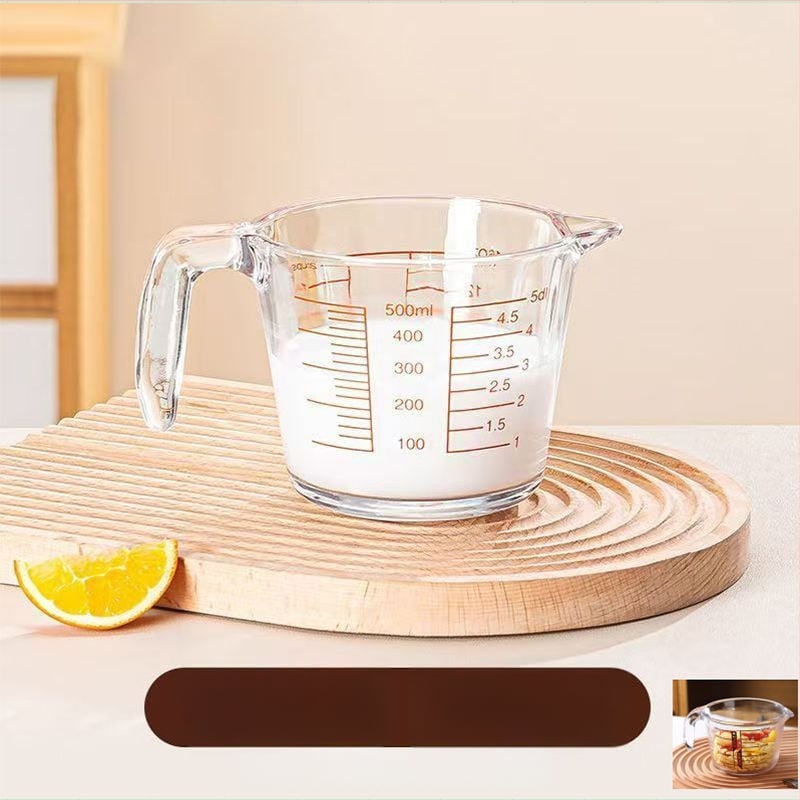 Sklenená odmerka s ml stupnicou, tepelne odolná, z borosilikátového skla, s držadlom, na pečenie.