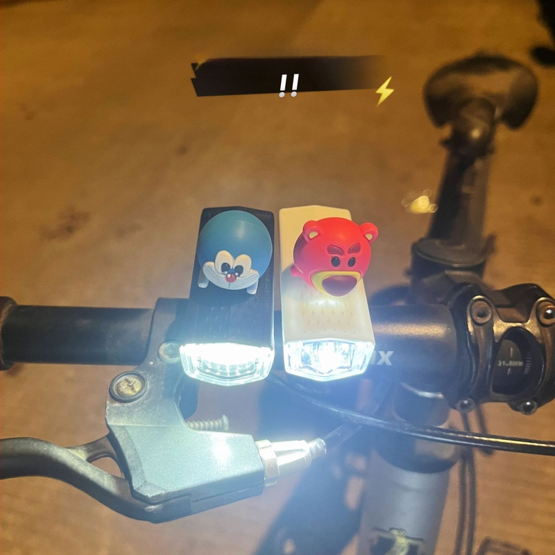 Предна велосипедна светлина за нощно каране — сладък карикатурен дизайн, съвместима с планински пътища (Модел: ltao1025187043; Тип светлина: предна; За: нощно каране; Функция: предупредителна светлина)