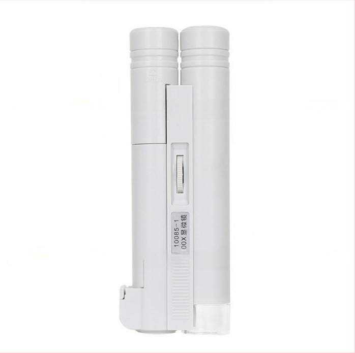 Käsihoidlik LED-mikroskoop 100x topelttoru disainiga juveelide, portselani, antiikesemete, müntide ja postmärkide identifikatsiooniks