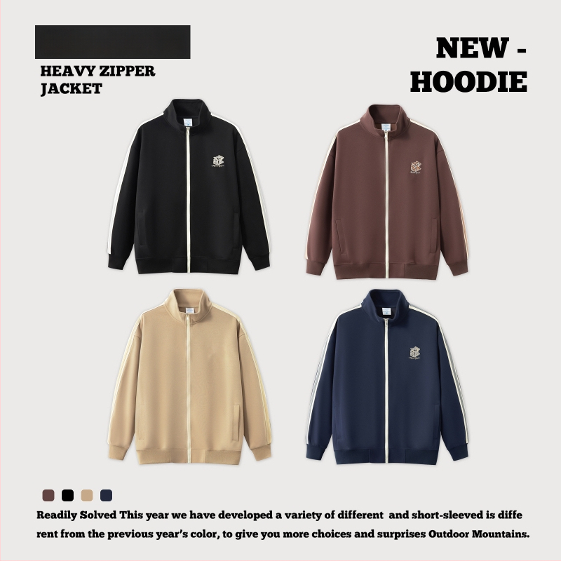 Õhku läbilaskev puuvillane jak, tõmblukuga, püstise kaelaga, vaba lõige ja pikkade varrukatega.