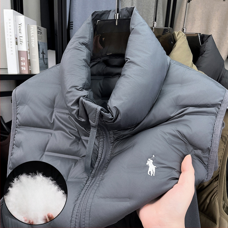 Vesta s perovou výplňou, stojací golier, predný zips, kapsy na zips, zimné nosenie