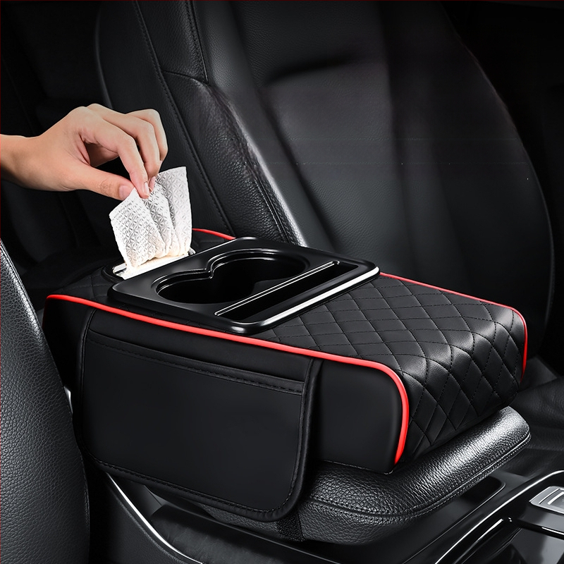Universāla ādas auto roku balsts ar pacēlumu un četrām funkcijām: uzglabāšanas kabatiņa, salvetēm nodalījums, centrālais krūžu turētājs; svars 450 g