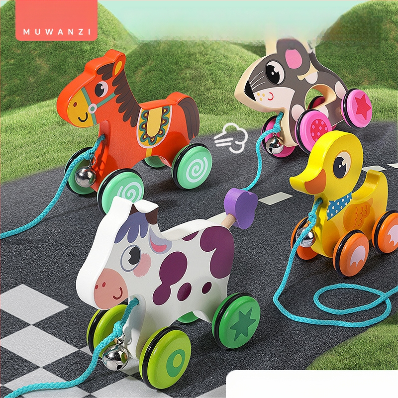 Drevená ťahacia chodítko hračka pre deti 4–6 rokov s motívom kresleného zvieraťa; materiál: drevo; značka: Big hand in small hand; rozvíja koordináciu ruka-oko