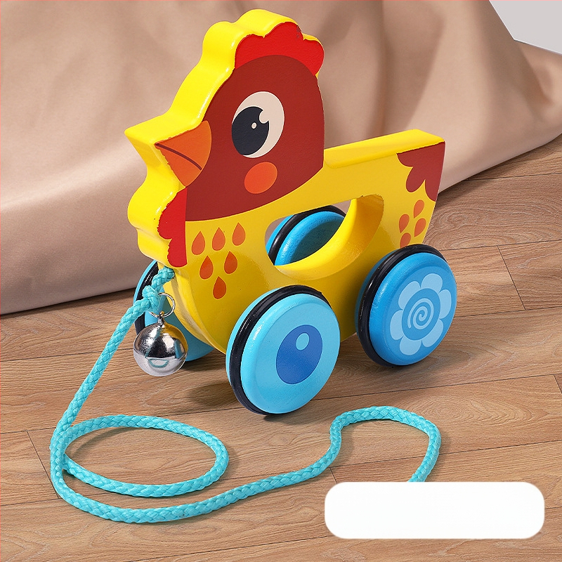 Drevená ťahacia chodítko hračka pre deti 4–6 rokov s motívom kresleného zvieraťa; materiál: drevo; značka: Big hand in small hand; rozvíja koordináciu ruka-oko