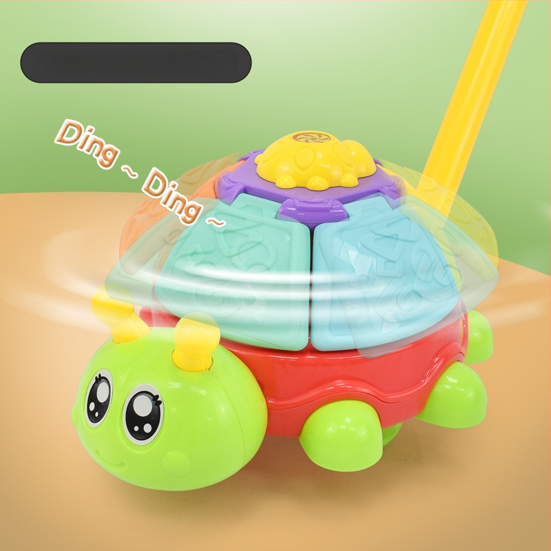 Detská ťahacia hračka s figúrkami zvierat (pterozaur, krab, chrobák, zajačik) — z plastu, s jednou tyčou, hudobný zvonček, hojdať sa a otáčať sa