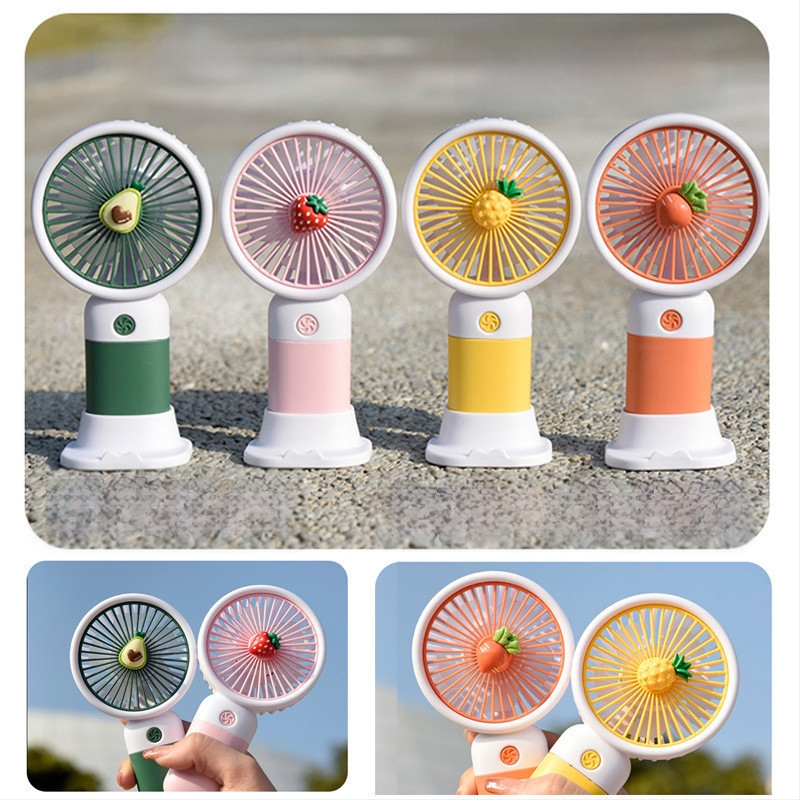 Mini ručný stolný ventilátor, kreslený štýl, plastová konštrukcia (Materiál: Plast; Štýl: Karikatúra, Mini; Pre internát)