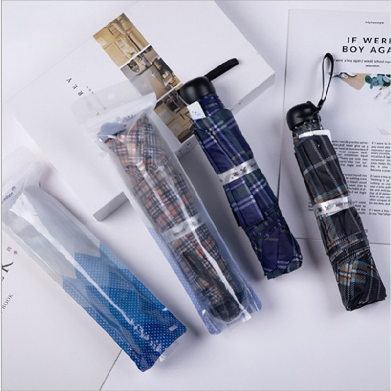 Paradise dáždnik: trojskladaný kockovaný vzor, 10 oceľových lúčov, látka z polyesteru 210T, ručné otváranie, UPF >40