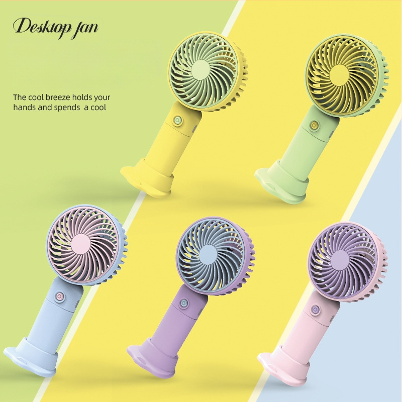 USB įkraunamas stalinis mini ventiliatorius su telefono laikikliu, 3 mentelės, 3 greičiai, triukšmas 36-45 dB