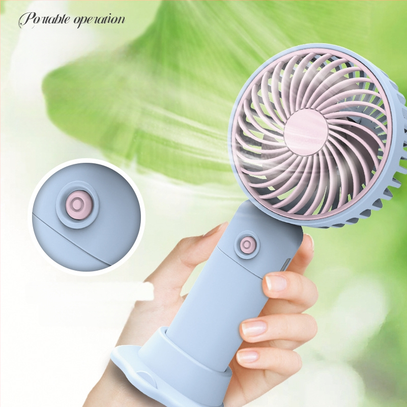 USB įkraunamas stalinis mini ventiliatorius su telefono laikikliu, 3 mentelės, 3 greičiai, triukšmas 36-45 dB