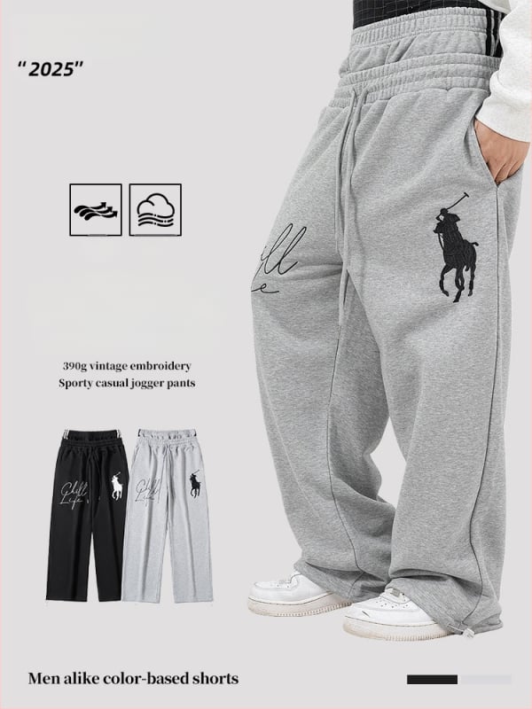 Amerika stiilis retro sportpüksid izšūtu logoga ja kahekordse vööga, sportlik-igapäevane stiil, vaba lõige, sirge sääre, terry puuvillase-poliestri segu 50/50
